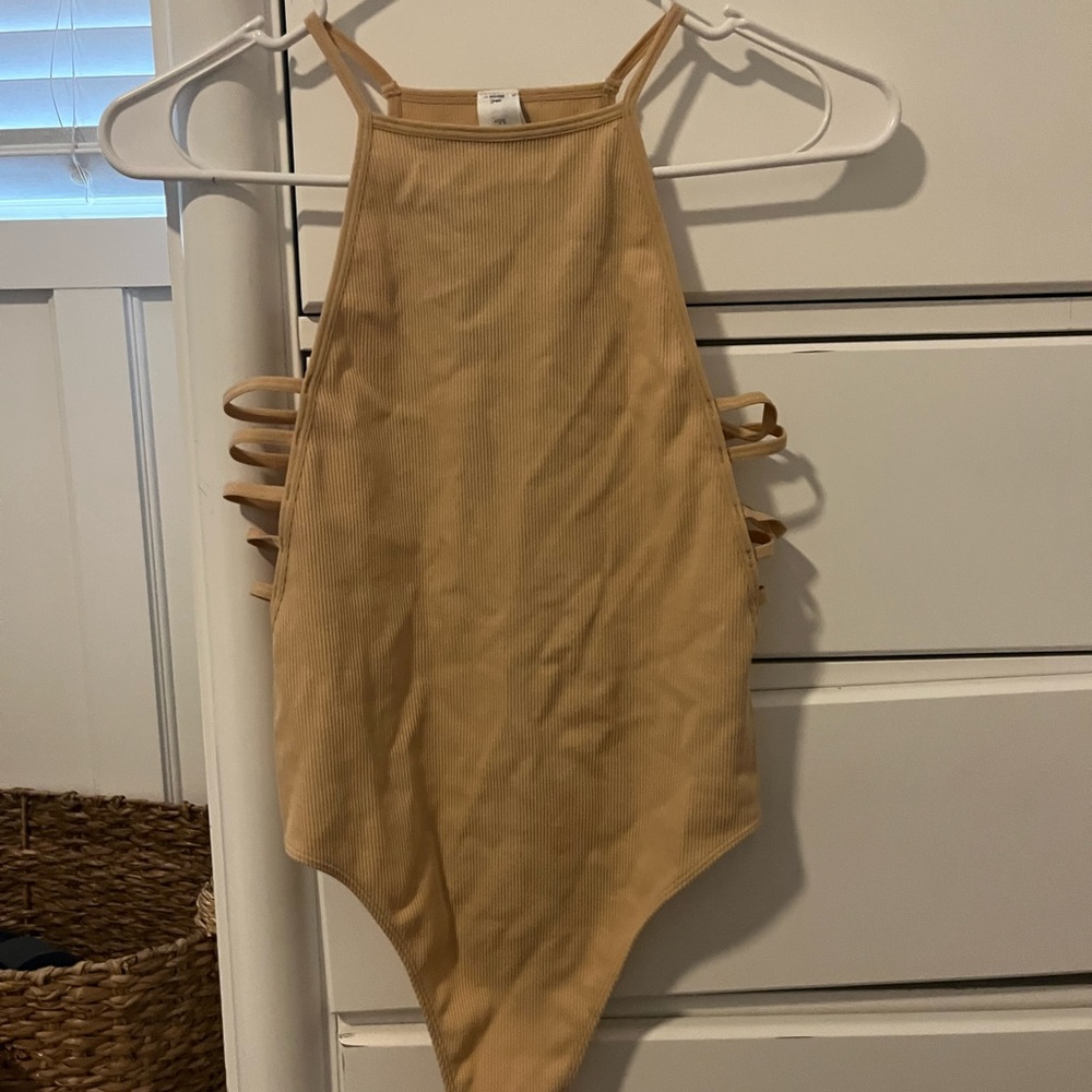 tan body suit